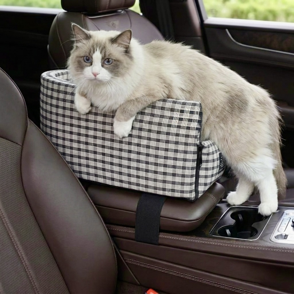 Long-haired cat climbing into the Tomo Console Seat in Charcoal Plaid on a car centre console